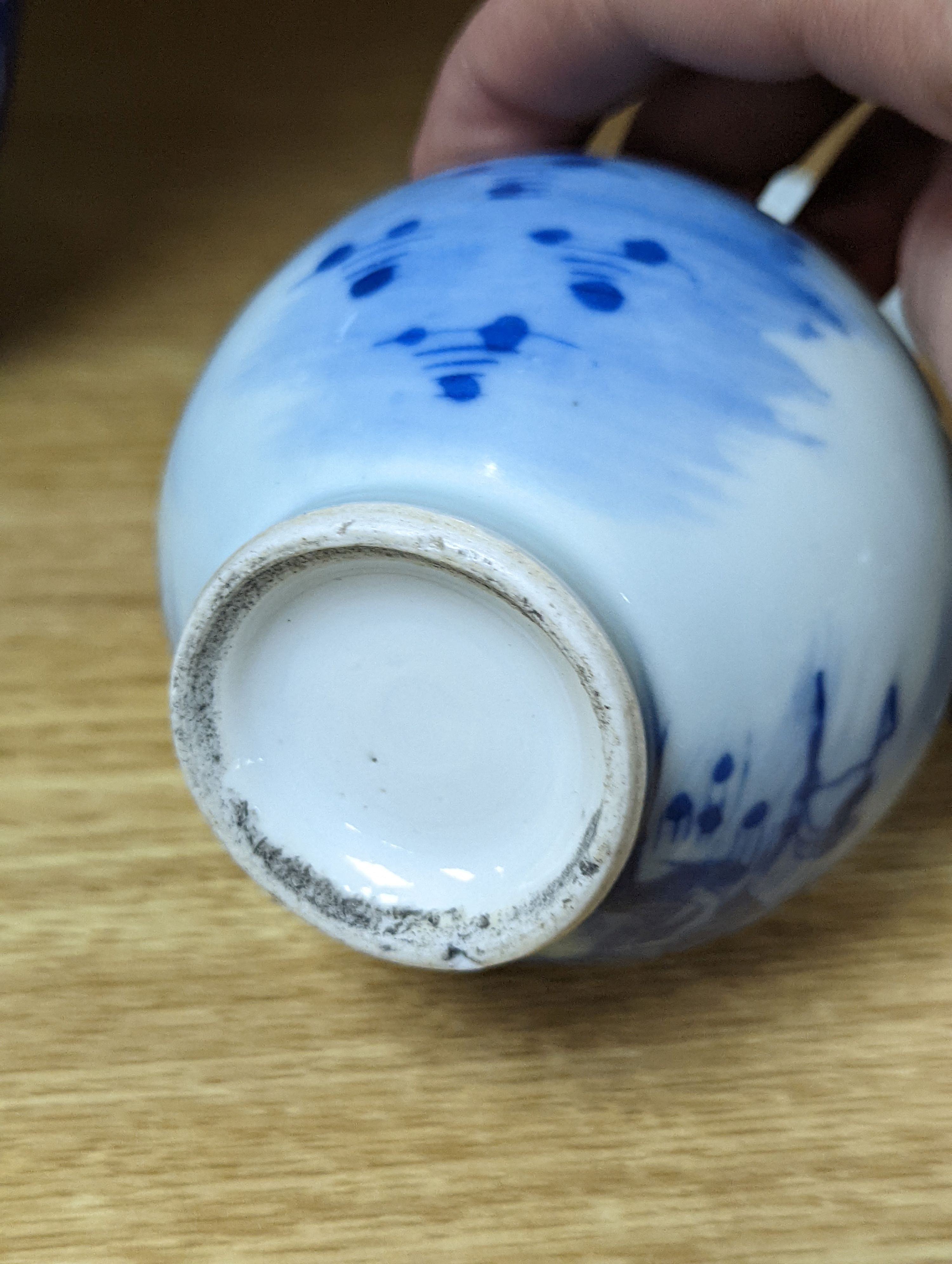 A 19th century Chinese famille rose rice bowl, cover and stand, together with a blue and white dragon jar and similar bottle vase. Largest 18cm